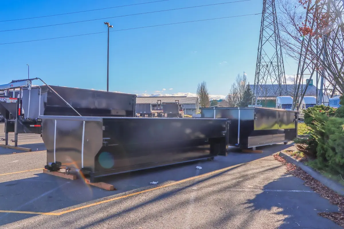 Roll-off dumpster ready for waste disposal at job site for 3 Yard Dumpster Rental in Merrifield